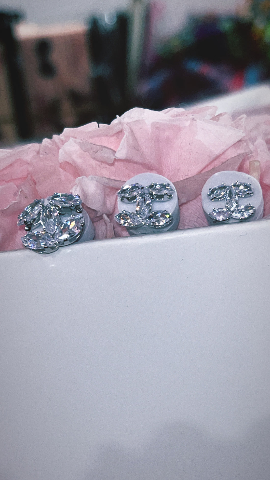 “Cc stud earrings”